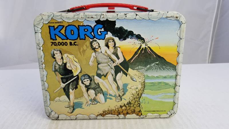 lot 3828 image: 1975 KORG 70,000 BC Vintage Metal Lunch Box