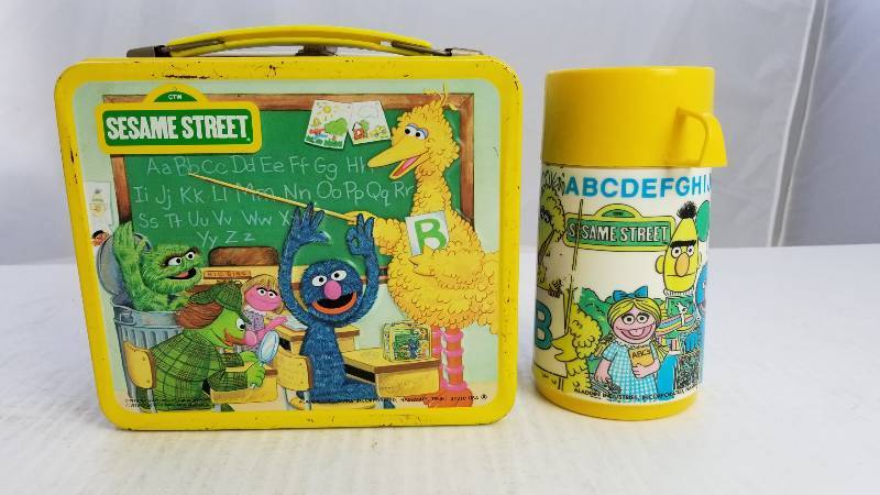 lot 3834 image: 1983 Sesame Street W Aladdin 8oz Thermo Bottle Vintage Metal Lunch Box