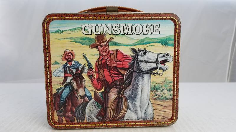 lot 3845 image: 1973 Gunsmoke Vintage Metal Lunch Box