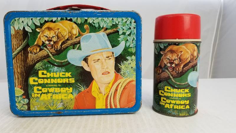 lot 3848 image: 1968 Chuck Conners Starring in Cowboy in Africa W 8oz Glass Lined Thermos Vintage Metal Lunch Box