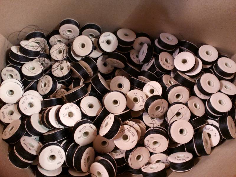 lot 15 image: Nylon Thread Bobbins with Black Thread