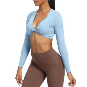lot 91483 image: Aoxjox Long Sleeve Crop Tops for Women Sienna Twist Deep V Workout Crop T Shirt Top (Light Blue, Medium)