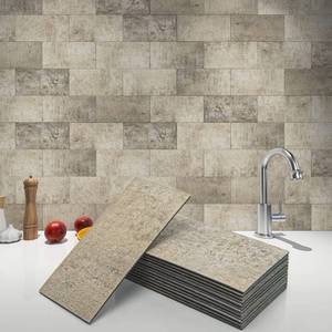 lot 90103 image: Art3d 102-Piece Peel and Stick Wall Tile for Kitchen Backsplash, Bathroom, Fireplace, 3in.  6in. Stick on Subway Tile Stone Beige
