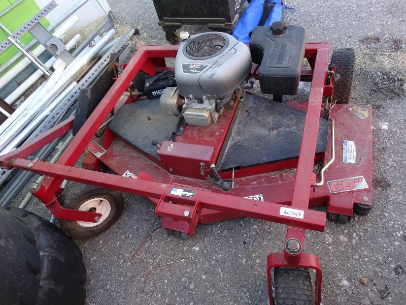 lot 321 image: Swisher 14.5 hp gas pull behind finish mower