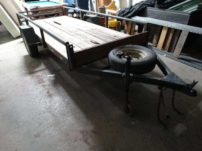 lot 1 image: 2 wheel utility trailer- 2 ball- Good rubber- Spare tire