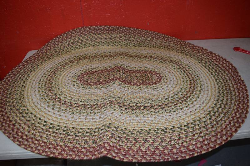 lot 294 image: Oval Braided Rug