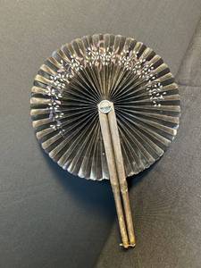 lot 6 image: Antique Cockade Hand Painted Oil Cloth Hand Fan Leather Covered Wood Handle