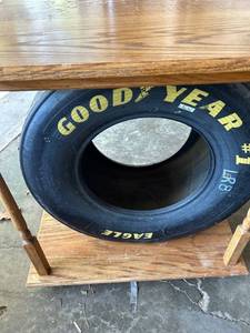 lot 5470 image: Man Cave Must Have Dale Earnhardt racing tire mounted into a table