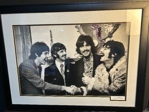 lot 5486 image: Sargent Peppers Press Launch, London 1967. Beatles framed photo taken by Linda McCartney