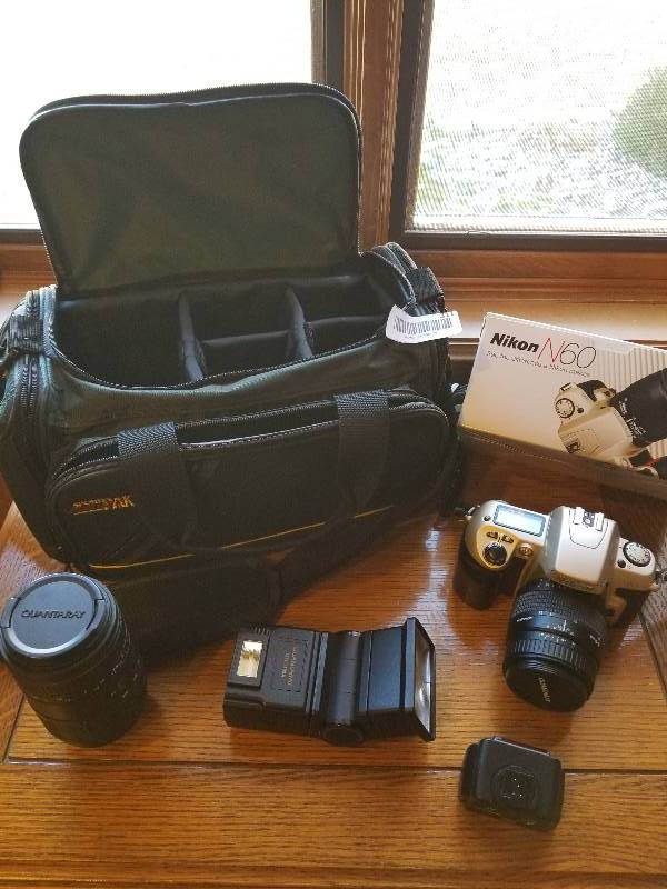 lot 311 image: Nikon 35mm Camera with Telephoto Lens and more