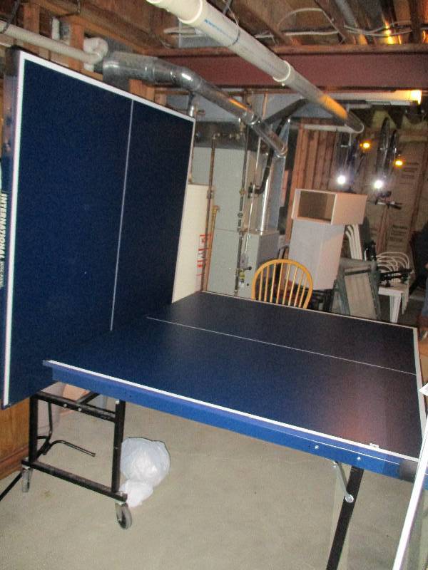 lot 1150 image: International Ping Pong Table and Accessories