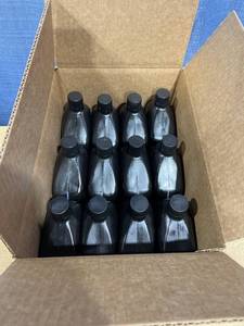 lot 1228 image: Prime Series SAE 10W-40 API SP Motor Oil. 121 QT Bottles.