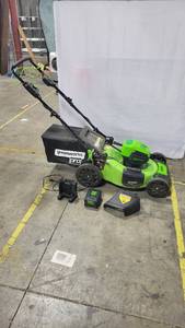 lot 56408 image: 21 Greenworks Pro 60 Volt Mower With Battery, Charger, Bagger, & Side Chute Tested and Ready To Work 