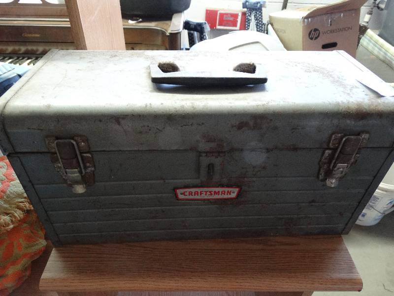lot 951 image: Metal craftsman toolbox and contents.