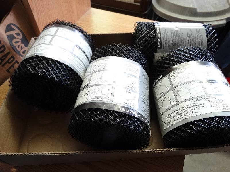 lot 980 image: 4 new packs of gutter guard.