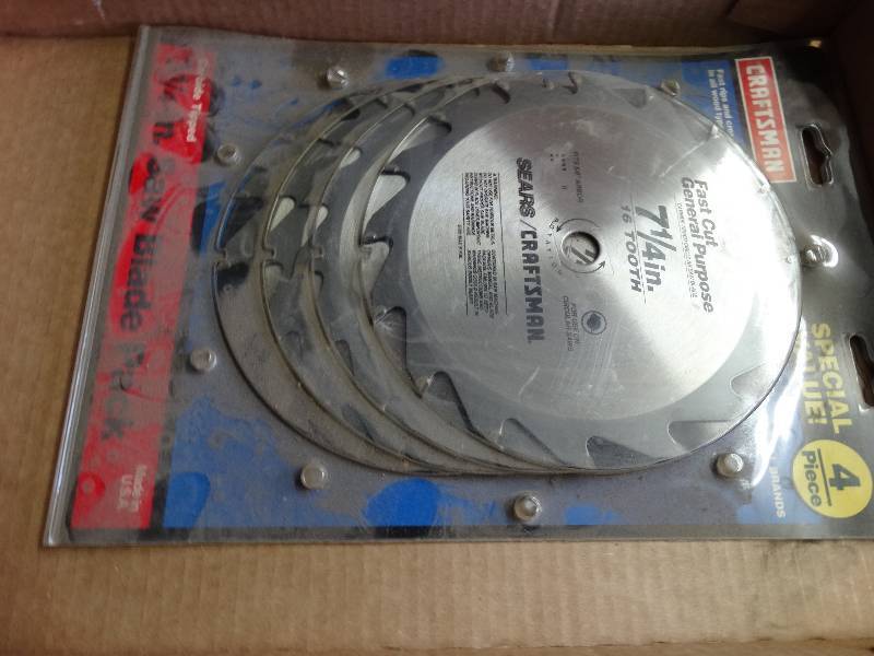 lot 985 image: Craftsman 7 14 16 tooth saw blade 4 pack.