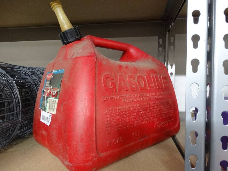 lot 987 image: 5 Gallon gas can.