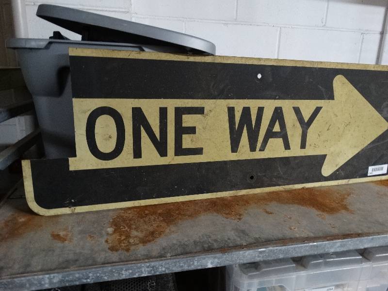 lot 1040 image: One way metal sign.