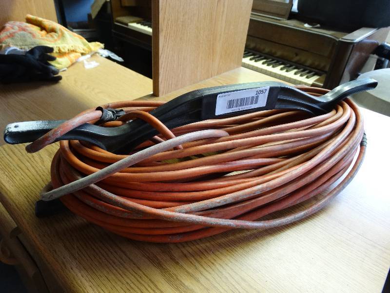lot 1057 image: Extension cords on reel.