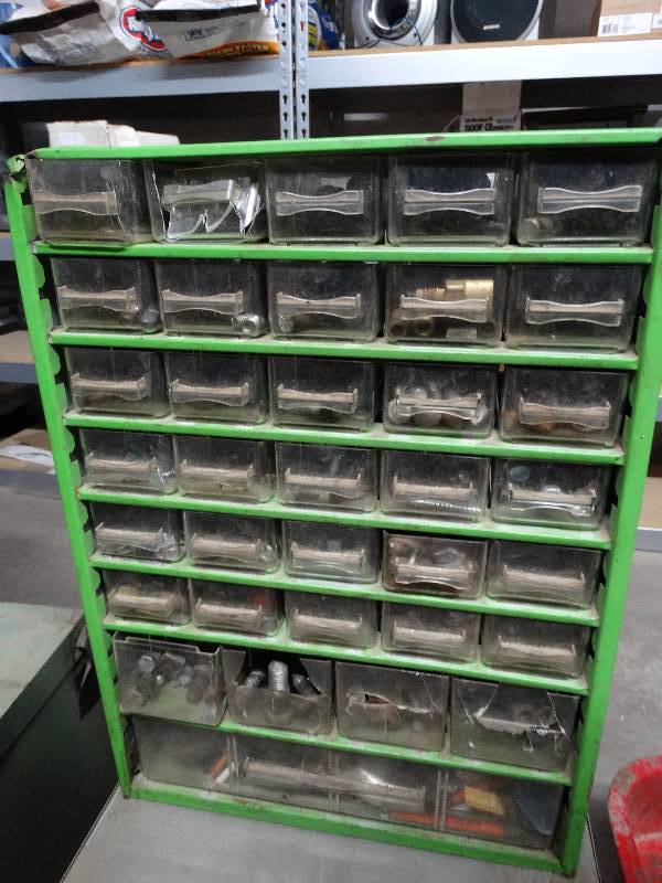lot 1060 image: Hardware cabinet and contents.