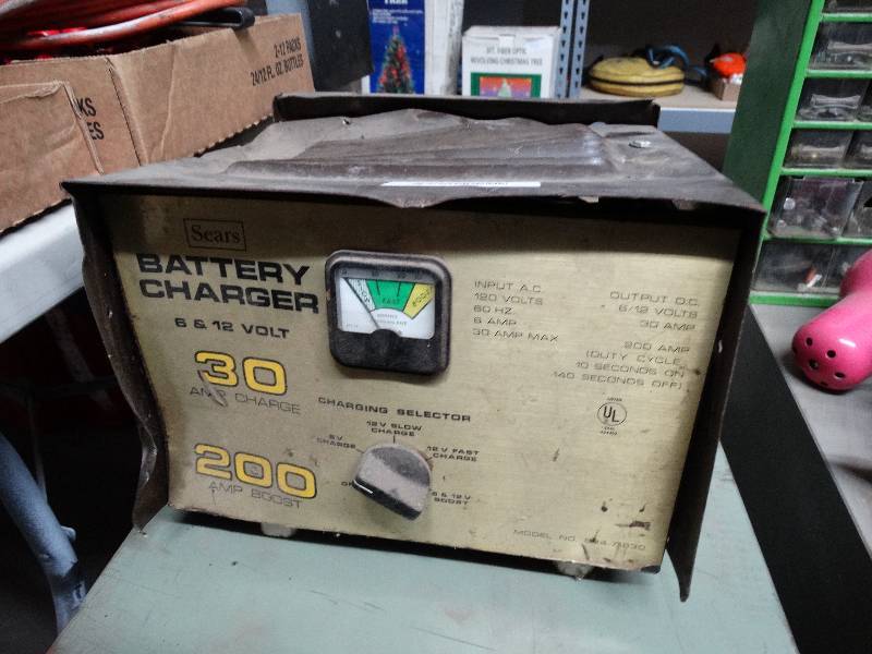 lot 1062 image: Sears battery charger 6 & 12 volt. 30 amp charger, 200 amp boost.