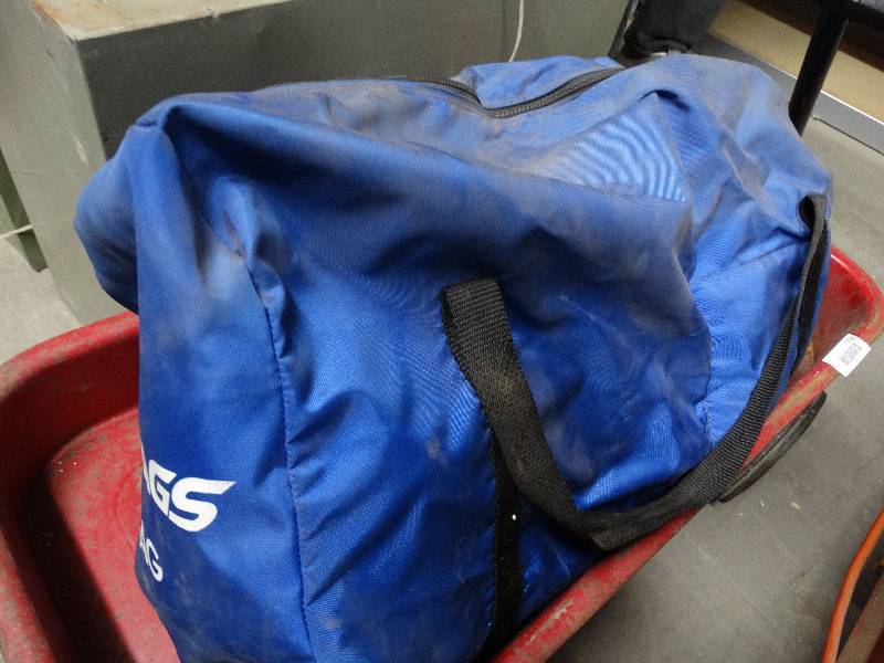 lot 1065 image: Bag of motorcycle helmet, neck brace, gloves.