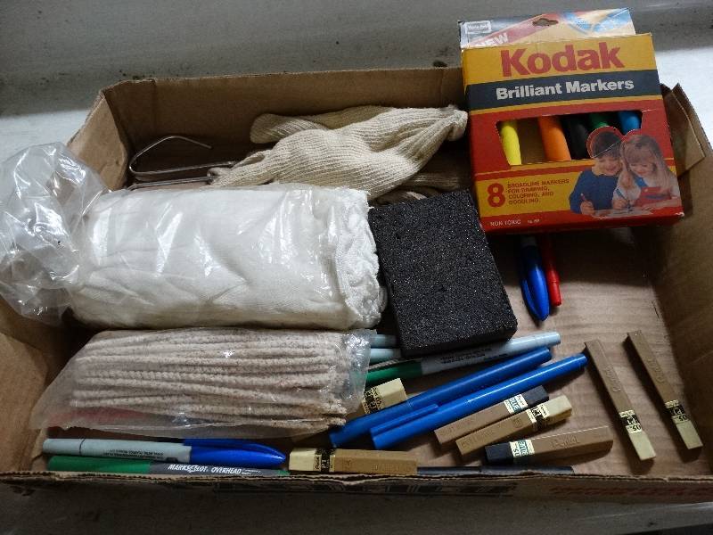 lot 1075 image: Lot of gloves and writing utensils.