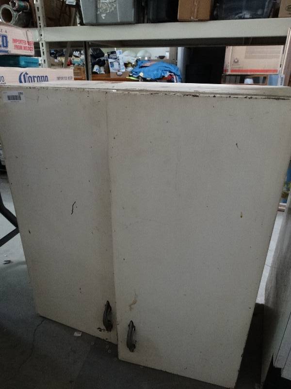 lot 1093 image: Metal wall cabinet. 27 wide and 30 tall