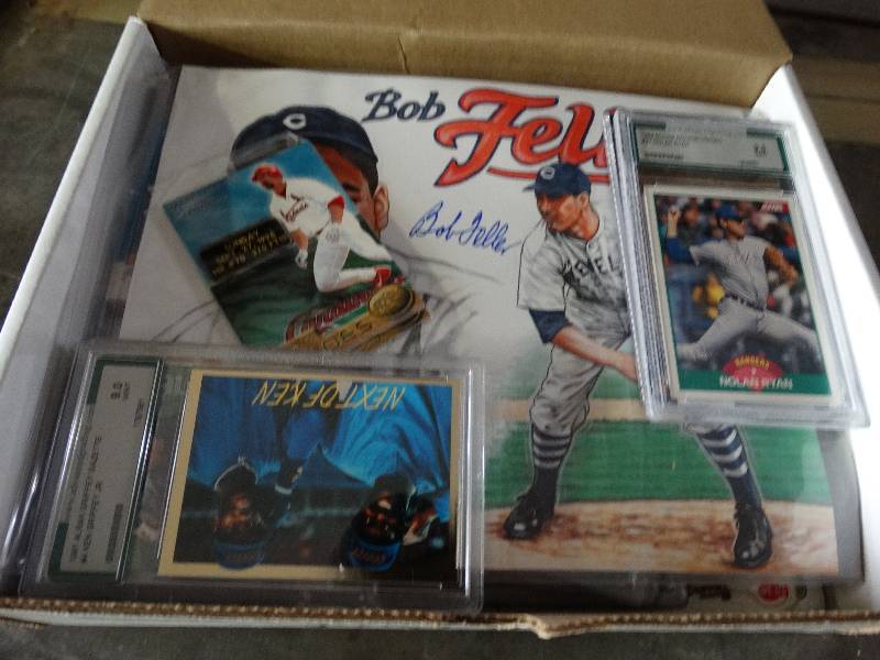 lot 1109 image: Rated baseball cards, unopened baseball card packs and Bob feller signed picture.