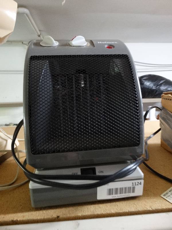 lot 1124 image: Holmes osculating space heater.