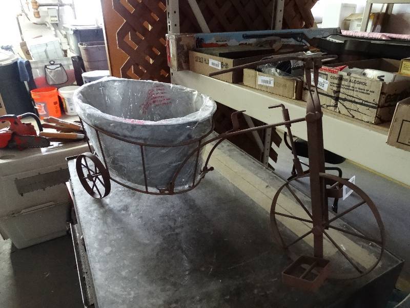 lot 1129 image: Metal tricycle planter.
