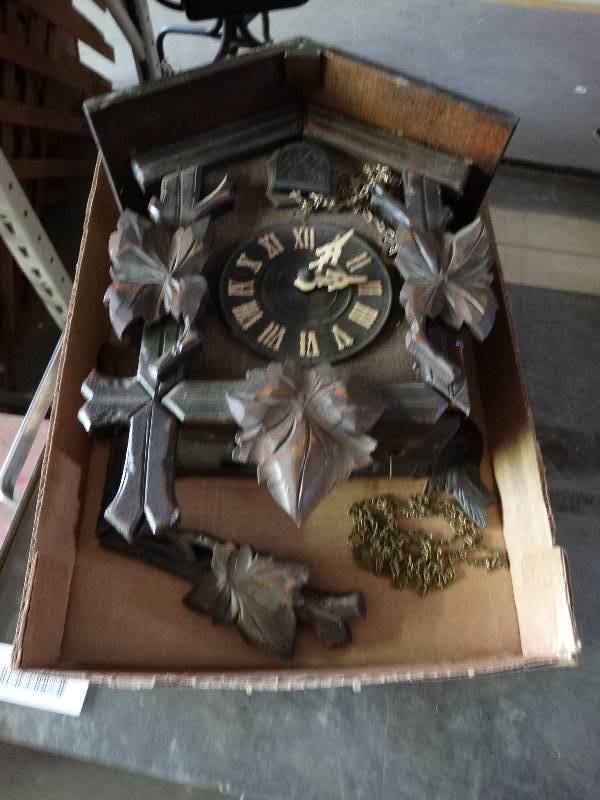 lot 1148 image: Old cuckoo clock, needs repaired.