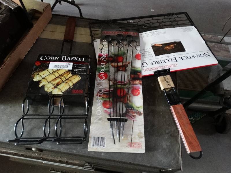 lot 1149 image: Grill baskets and shikabob sticks.