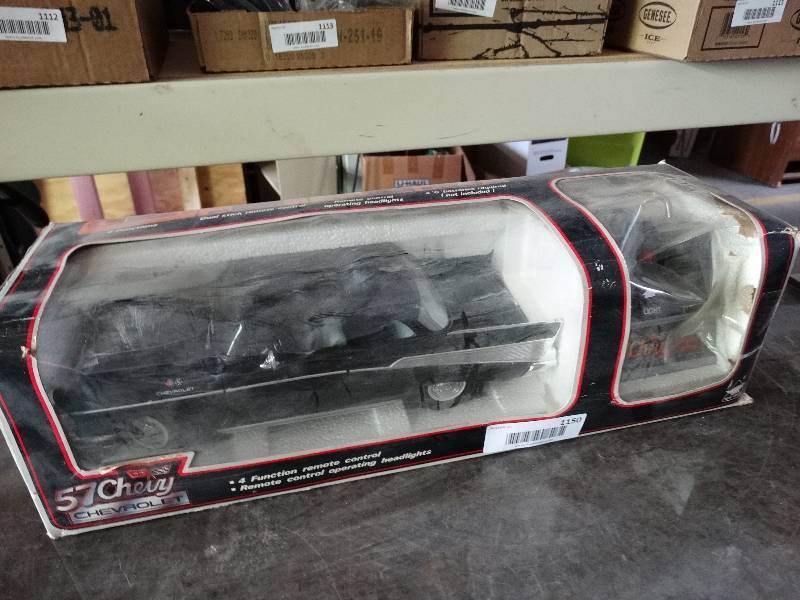 lot 1150 image: 57 Chevy remote controlled car.