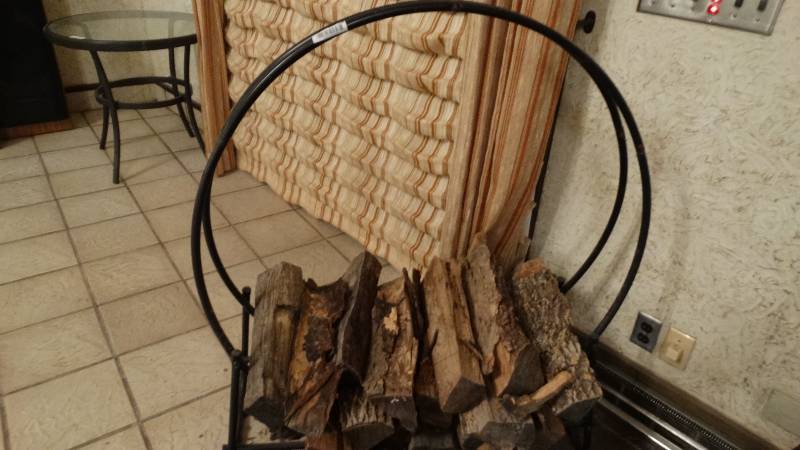 lot 109 image: Metal firewood rack