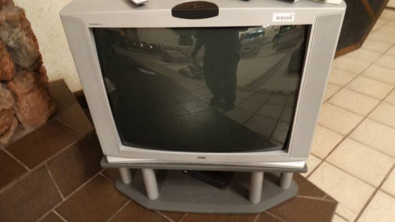 lot 114 image: RCA TV w stand & remote
