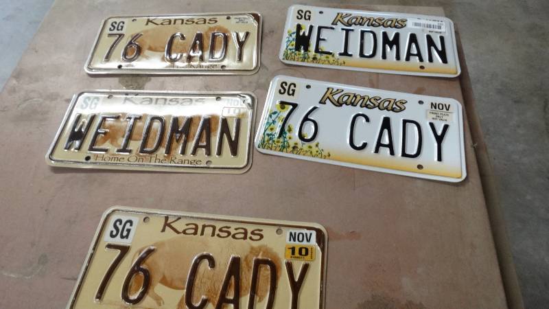 lot 345 image: 5 Kansas license tags
