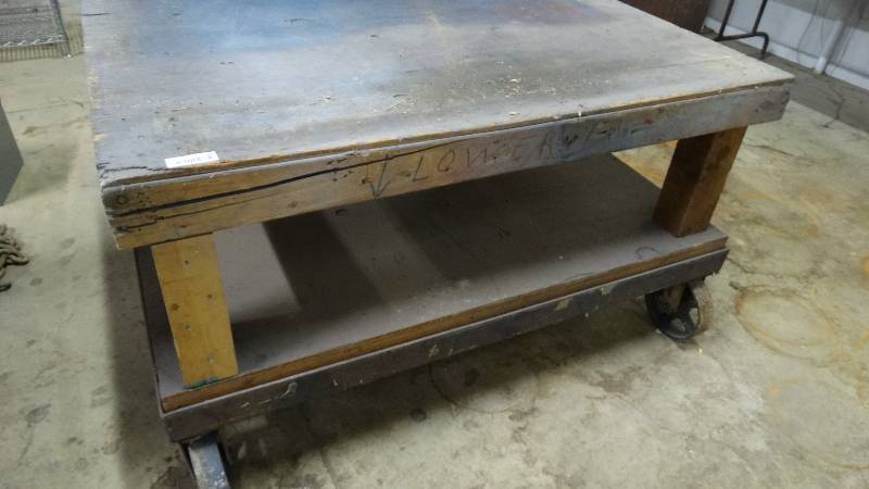 lot 463 image: Heavy duty shop table on metal wheels