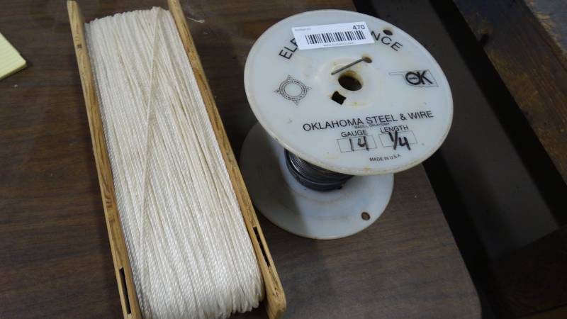 lot 470 image: Partial roll of electric fence wire & roll of twine