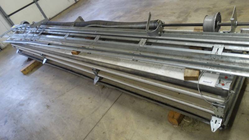 lot 528 image: Large garage door w tracksspring- 146 wide- 7 panels