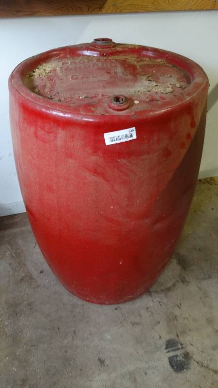 lot 530 image: Old metal 56 gallon standard oil drum