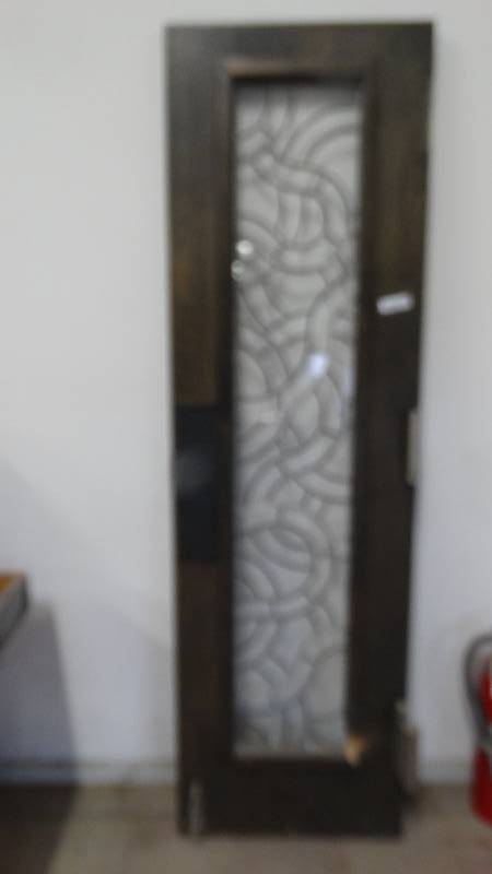 lot 542 image: Custom dual swing door w leaded glass window