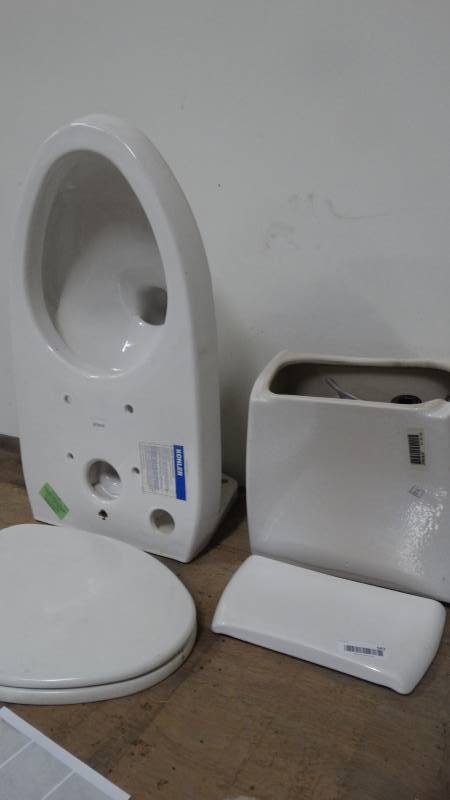 lot 543 image: Kohler wall mount toilet- New
