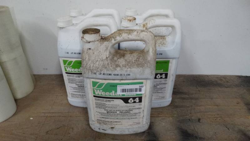 lot 560 image: 5- gallon jugs of 2,4 D weed killer