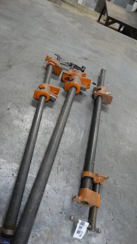 lot 578 image: 3 pipe clamps- 23 long