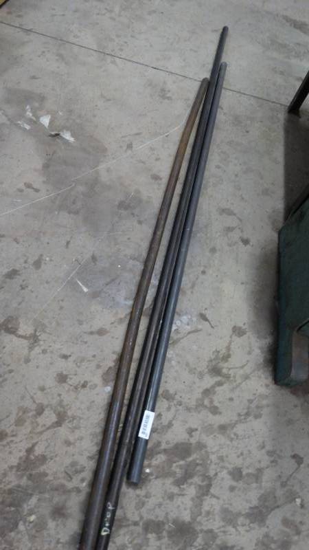 lot 588 image: 3 solid bar stock- 1- longest is 8 ft