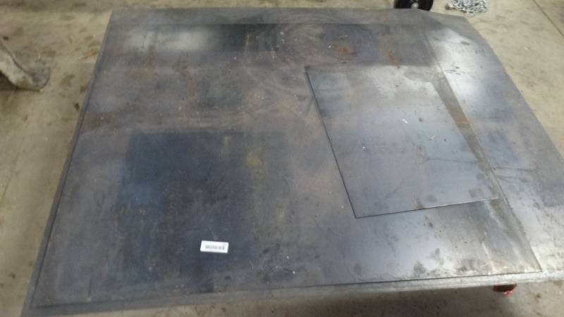 lot 597 image: Lot of various sized flat sheet metal stock