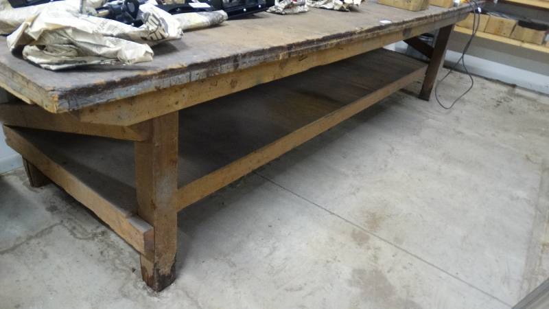 lot 610 image: Large wood shop table w Wilton shop vise