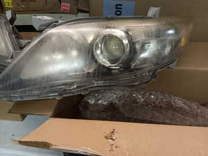 lot 15574 image: Left Driver and Right Passenger Side Headlight Halogen Clear Lens Chrome Interior Lens Model Chrome Housing for Toyota for Camry Hybrid 10-11