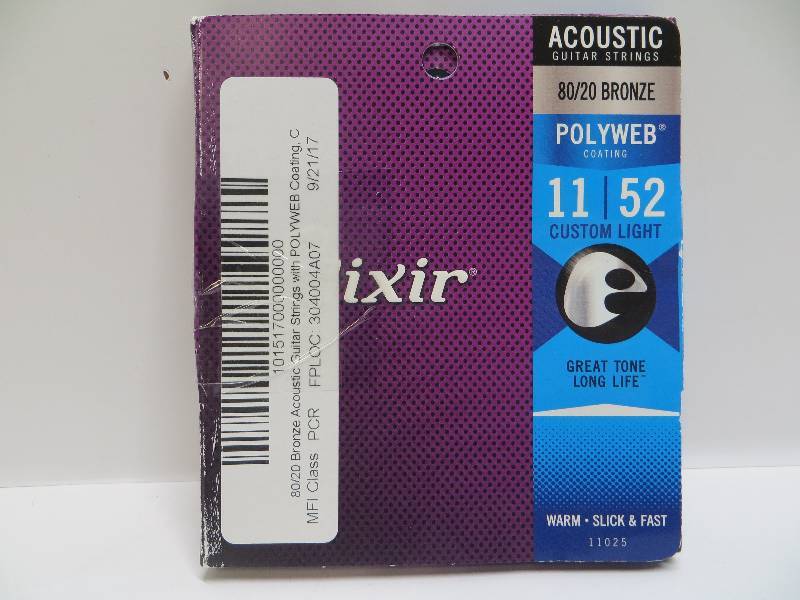 lot 1122 image: Elixir acoustic guitar strings polyweb coating 1152 custom light